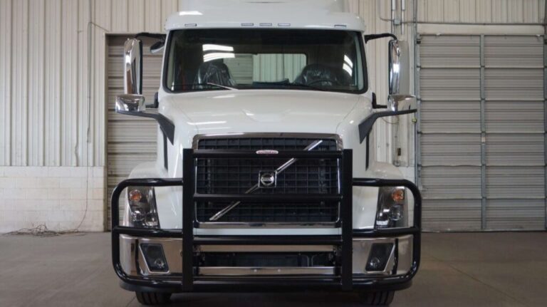 White Volvo Semi in Warehouse with Black RIGGUARD Grille Guard