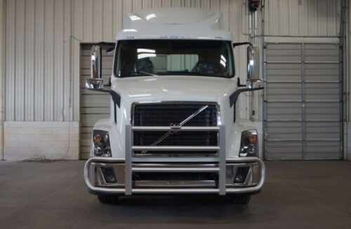 White Volvo Semi in Warehouse with Chrome RIGGUARD Grille Guard
