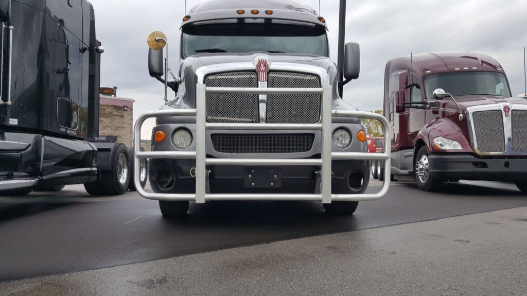 Black Kenworth Truck in a Lot with RIGGUARD Grille Guard