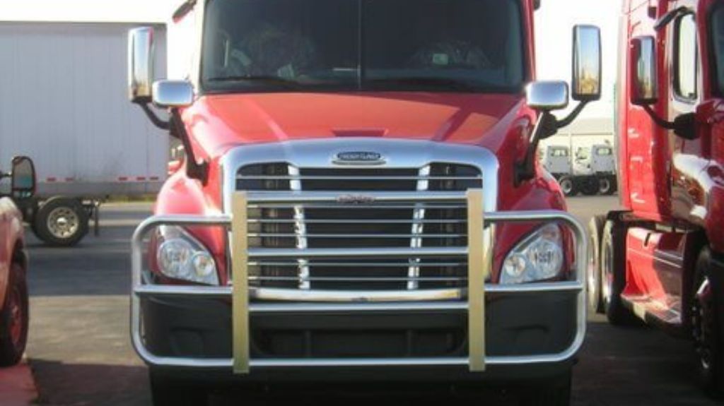 Red Freightliner Semi in Parking Lot with RIGGUARD Grille Guard